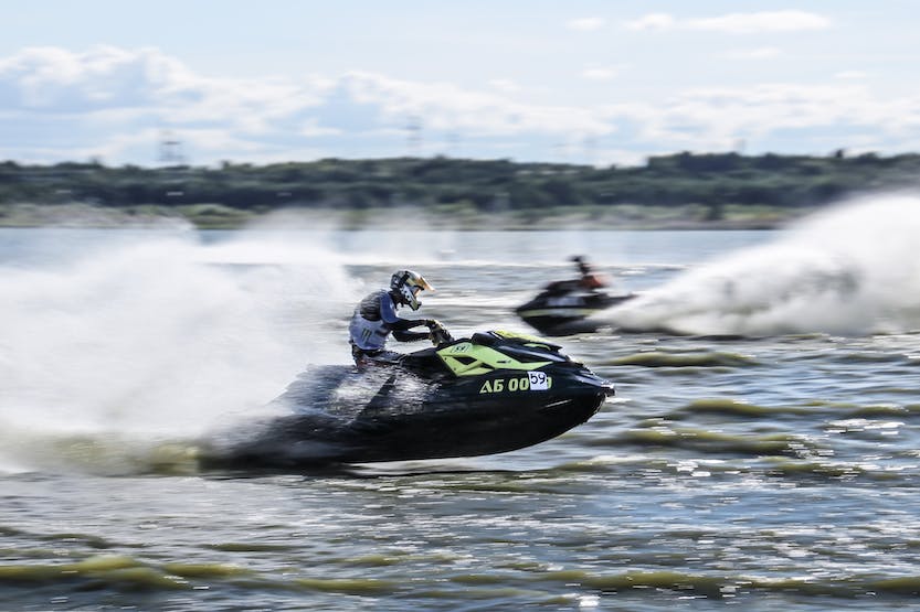 Man riding a jet ski.