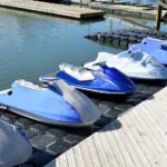 Jet-skis parked on the dock
